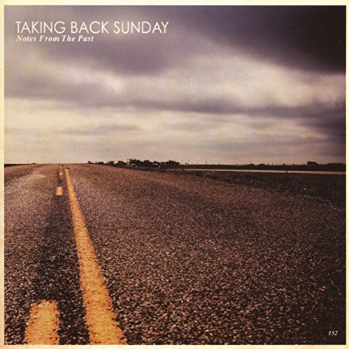 "Album cover with a long, straight road under a cloudy sky."