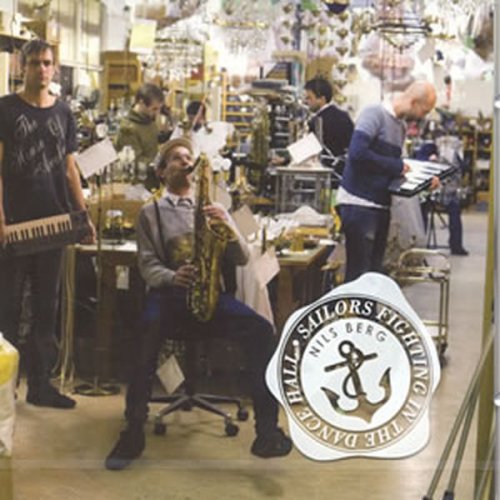 "CD cover featuring men playing instruments in a cluttered workshop with 'Nils Berg' logo."