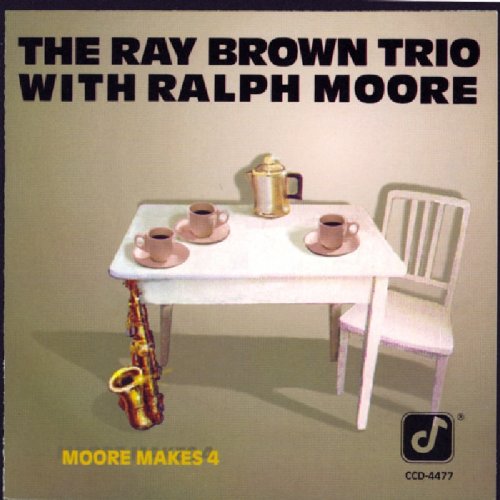 "CD cover featuring a table with cups, a saxophone, and a chair."