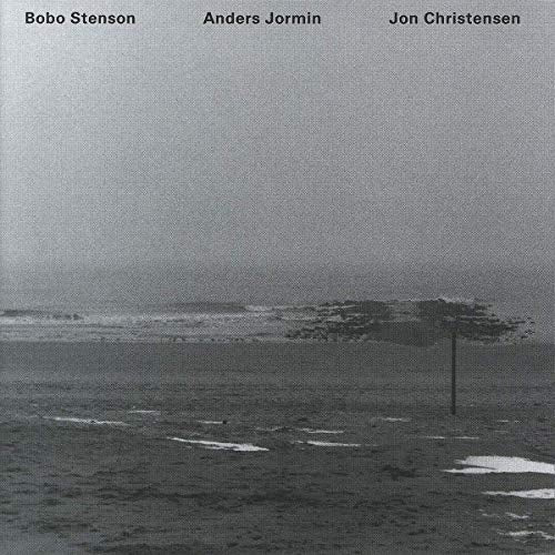 "CD cover with a grayscale beach scene and three names at the top."