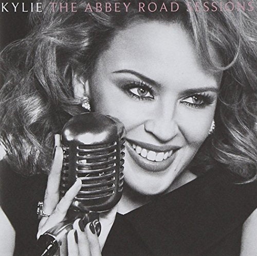 Black and white album cover featuring Kylie Minogue holding a vintage microphone.