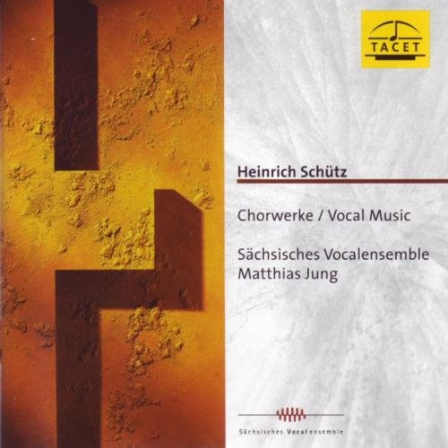 A CD cover featuring a cross on a textured orange and grey background.