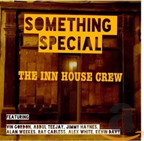 "CD cover with 'Something Special' text on yellow background, featuring artist names below."