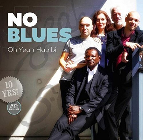 "CD cover featuring five musicians posing together, with title 'No Blues' prominently displayed."
