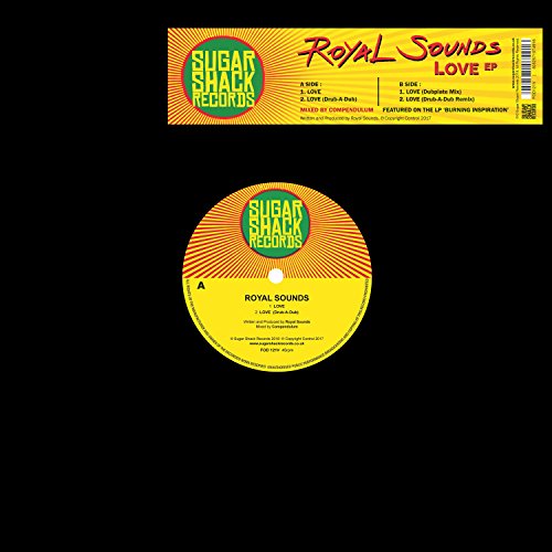 Yellow vinyl record with orange stripes and "Sugar Shack Records" label on a black background.