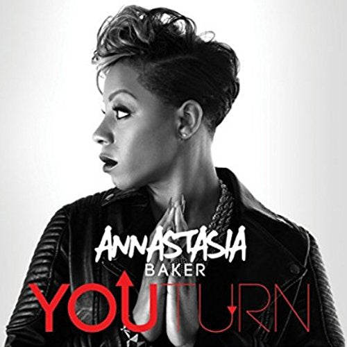 "CD cover featuring a black-and-white photo of Annastasia Baker with red and white text."