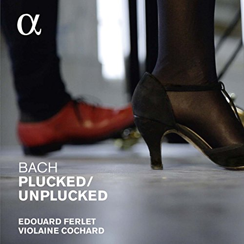 A CD cover featuring two people's legs and high heels, with white text overlay.
