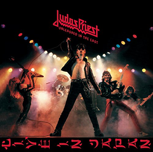 Judas Priest album cover featuring the band performing on stage with colorful lights.
