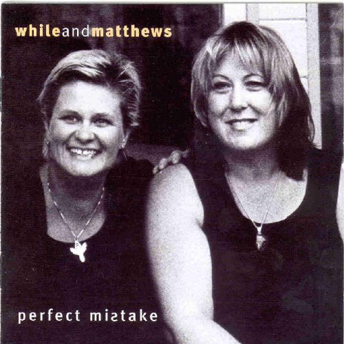 Black and white CD cover with two smiling women and text "whileandmatthews perfect mistake".