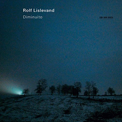"CD cover with a dark, snowy landscape and white text."