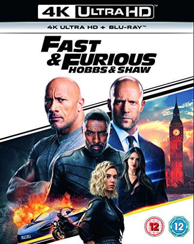 "Blu-ray cover featuring four main characters and a burning car, with Big Ben in the background."