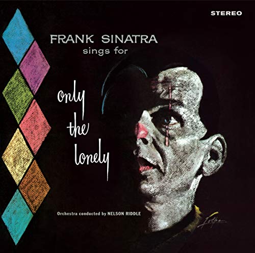 "Album cover with a crying man and colorful diamonds on a black background."