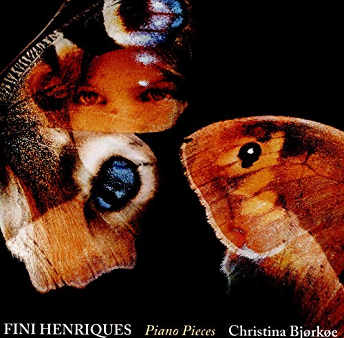 "CD cover with moth wings and a child's face on a black background."