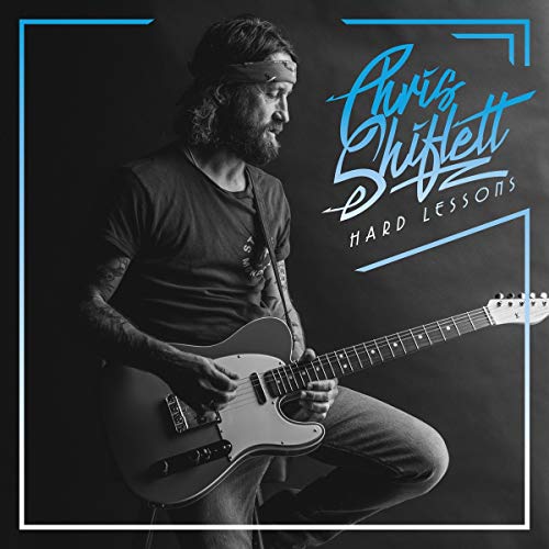 Album cover with a man playing guitar, surrounded by a blue and white border.