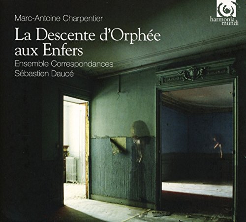 "CD cover with dimly lit room and open doorway, ghostly figures."