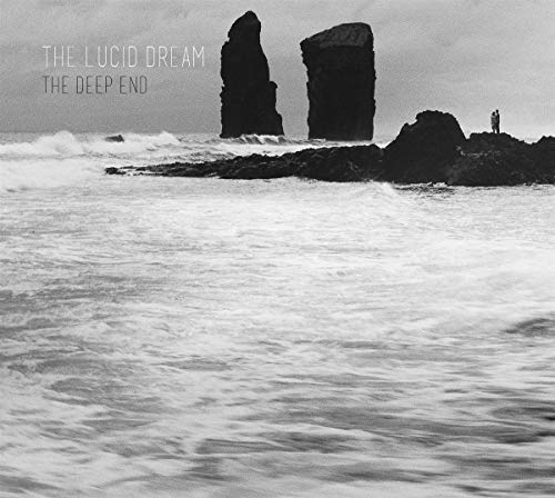Black and white album cover featuring rocky sea landscape with two tall rock formations.
