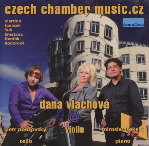 "CD cover with three musicians standing in front of a modern building."