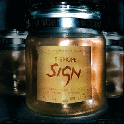 A glass jar with a label reading "The Hope Sign" in red text.
