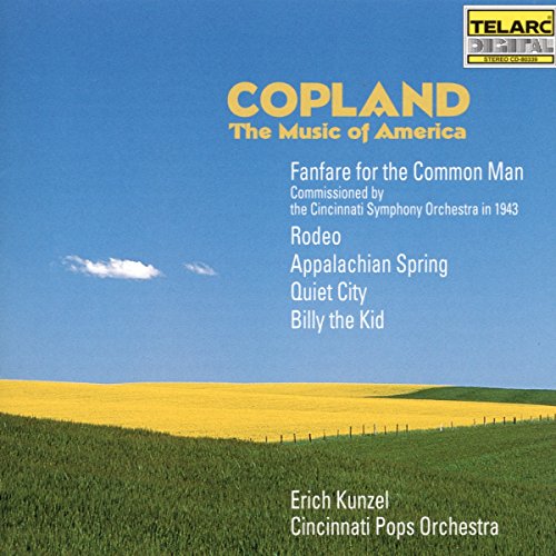 "CD cover featuring a green and yellow landscape under a blue sky."