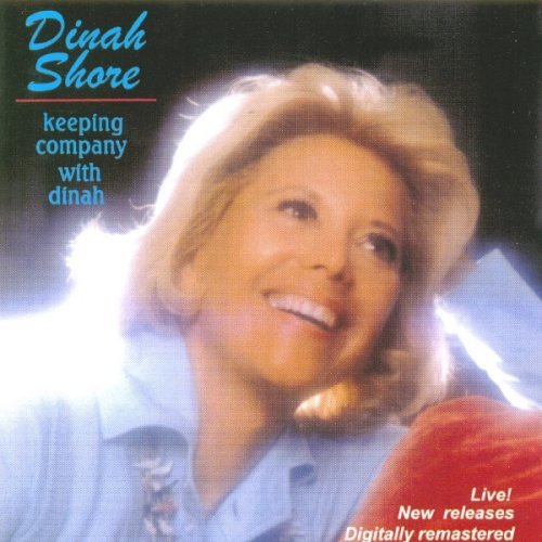 "CD cover featuring a smiling blonde woman, Dinah Shore, in a blue shirt."