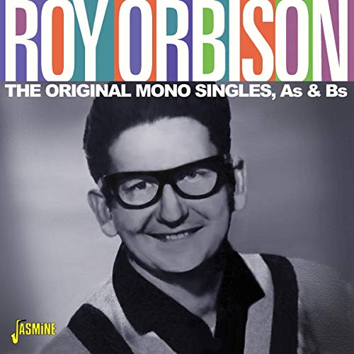 "Album cover featuring a black and white photo of Roy Orbison with multicolored title."