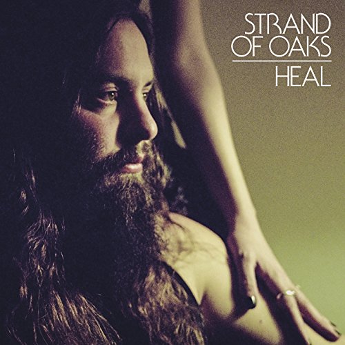 "Album cover featuring a man with long hair and beard, with a hand on his shoulder."