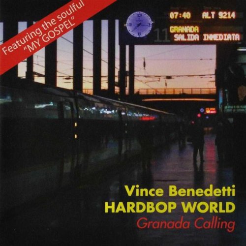 "Album cover with train station at dusk, digital sign, and red banner with white text."