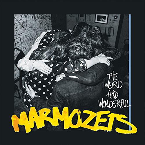 "CD cover with black and white photo of hugging band members and yellow text."