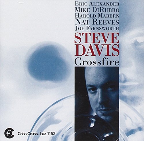 "Album cover with a man's face and trumpet, titled 'Steve Davis Crossfire'."