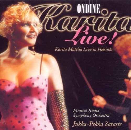 CD cover featuring a blonde woman in a pink polka dot dress.