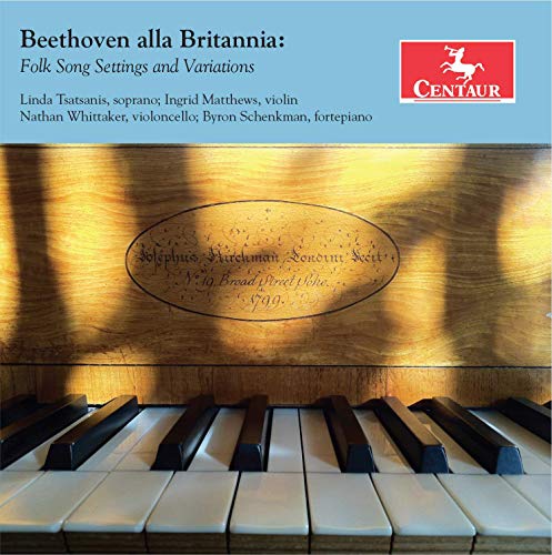 "CD cover featuring a piano's interior with illuminated keys and a gold plaque."