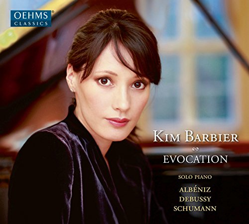 "CD cover featuring a woman with brown hair, wearing a black velvet top, beside a piano."