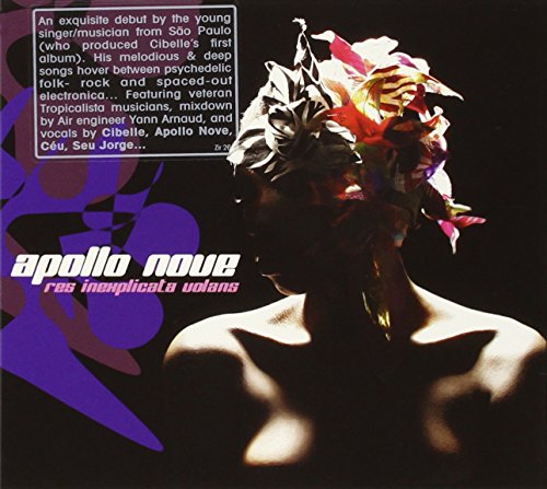 "CD album cover with a person wearing flowers on their head against a black background."