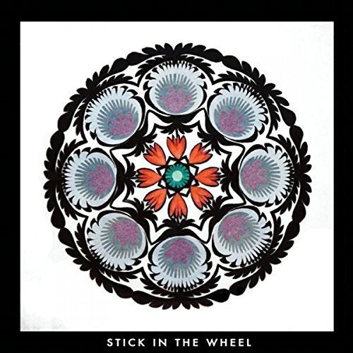 A CD cover featuring a colorful, symmetrical floral design on a white background.