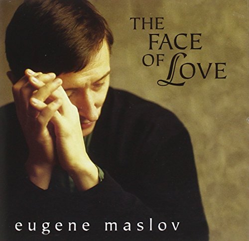 "Eugene Maslov's album cover featuring a man in black with hands clasped together."