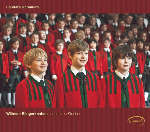 "CD cover featuring a group of boys in red and green choir robes."
