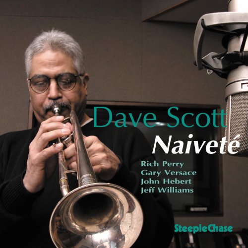 "Album cover featuring a man playing trumpet, with text overlay."