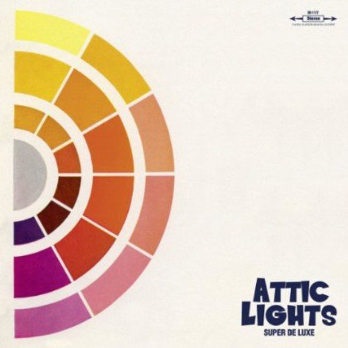 Album cover featuring a multicolored semicircle on a white background with "Attic Lights" text.