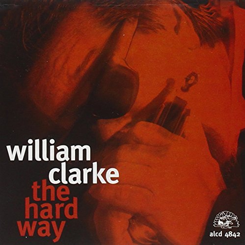 "Album cover with man holding harmonica, red-toned image, text 'William Clarke the hard way'."