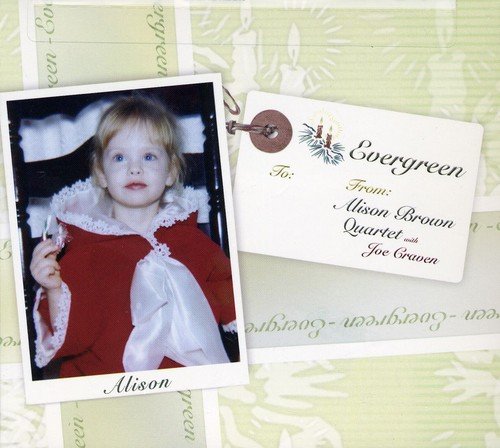 "CD cover with child's photo and 'Evergreen' title on a pale green background."