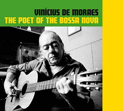 Album cover with black-and-white photo of man playing guitar, green and yellow text.