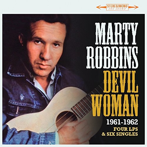Marty Robbins CD cover featuring a man holding a guitar against a black background.