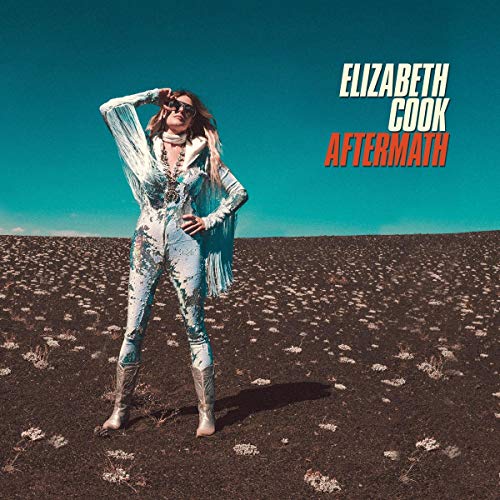 Album cover with woman in white outfit standing in a barren field.