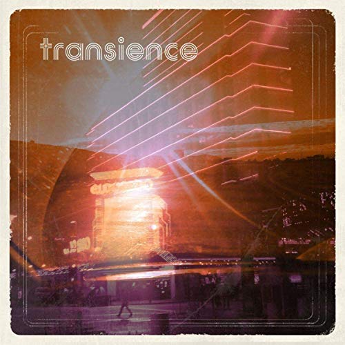 Album cover for "Transience" by Wreckless Eric, featuring a cityscape with bright light.
