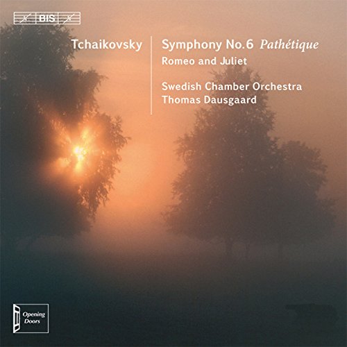 A CD cover featuring a sunrise or sunset between trees with white text overlay.