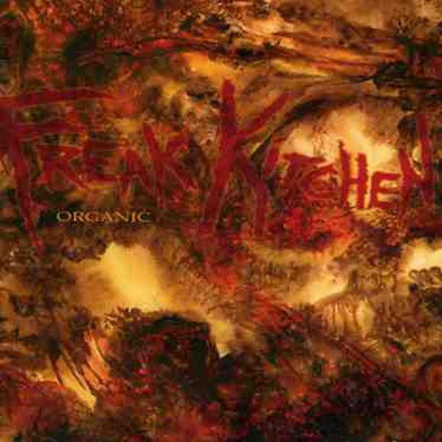 "Freak Kitchen" album cover with abstract, fiery artwork and red, stylized band name.