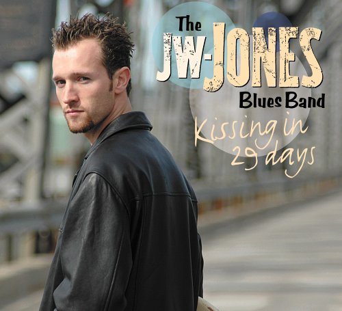 "Album cover featuring a man in a black leather jacket."