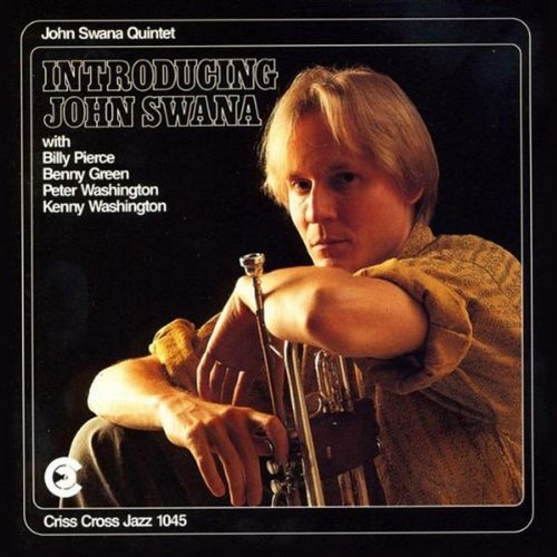 Album cover with a man holding a trumpet against a black background.
