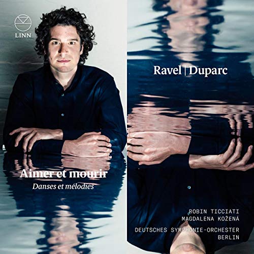 CD cover art featuring a man standing in water with folded arms.