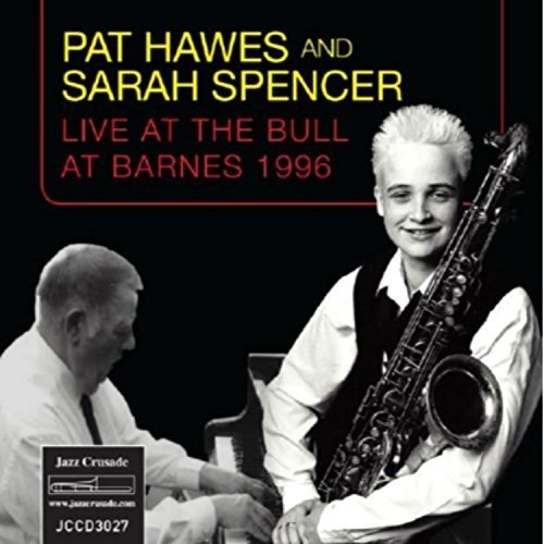 Album cover featuring a man and woman, with the woman holding a saxophone.
